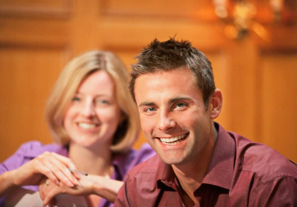 A couple of course mates smiling